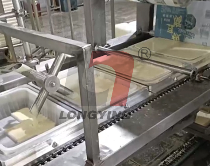 龍應(yīng)豆腐全自動灌裝封口機(jī) 龍應(yīng)豆腐全自動灌裝封口機(jī)