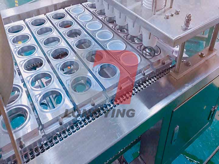 龍應(yīng)全自動灌裝封口機 龍應(yīng)全自動灌裝封口機