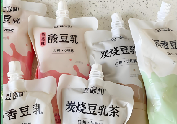 龍應(yīng)豆乳全自動灌裝封口機